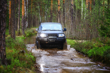Obraz na płótnie Canvas SUV forest ford across the river extreme road tourism 4 on 4