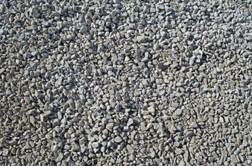 Many little stones. Gravel background. Gravel wallpaper.