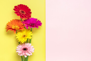 Bouquet of gerberas on yellow, pink background Top view Flat lay Holiday greeting card Happy moter's day, 8 March, Valentine's day, Easter concept Copy space Mock up