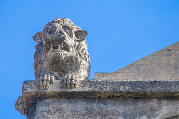 Obraz premium sculpture of a wild boar, ornament of the church of Santa Olaya de Selorio in Asturias, Spain.