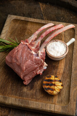raw meat steak on a wooden board in a premium restaurant
