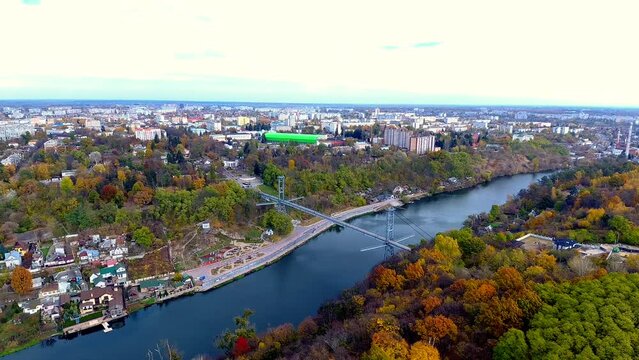 Bird's eye view of a bridge above a river flowing through Zhytomyr, Ukraine