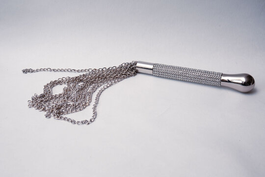 BDSM chain flogger isolated on white