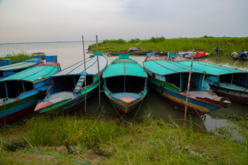 Beautiful Landscape View of Some Transportation  boats on the bank of the Padma river in Bangladesh