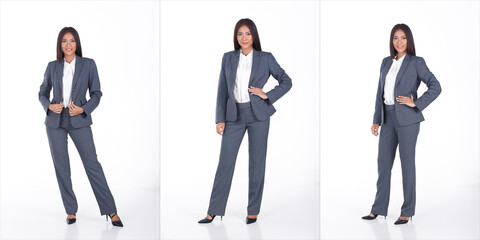 Full length Portrait of 20s Asian business Woman black short hair white shirt gray suit pant shoes