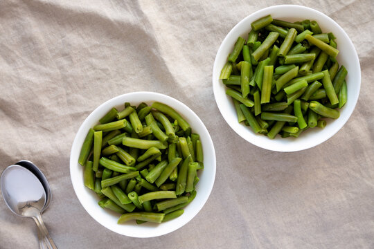 Steamed Green Beans In A White Bowl, Top View. Overhead, From Above, Flat Lay.