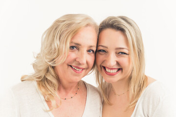 portrait of a beautiful blonde mom with her daughter, cute warm family concept. High quality photo