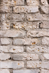 Closeup photo of white sand-lime brick for texture or background.