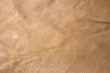 Photo of the texture of yellow genuine leather.Leather fabric background. Pure skin texture for...