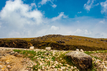 rocky mountain with bright blue sky at morning from flat angle