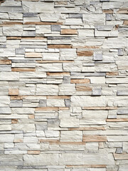 Facade decoration with decorative natural stone. Texture of decorative stone