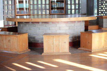 Concrete table with creative wood seat in a library at Zinda Park, Bangladesh. Interior decoration of a library.