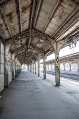 Naklejka na ściany i meble old railway station platform close-up