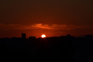 Tramonto sulle torri della citt&agrave; di Cagliari