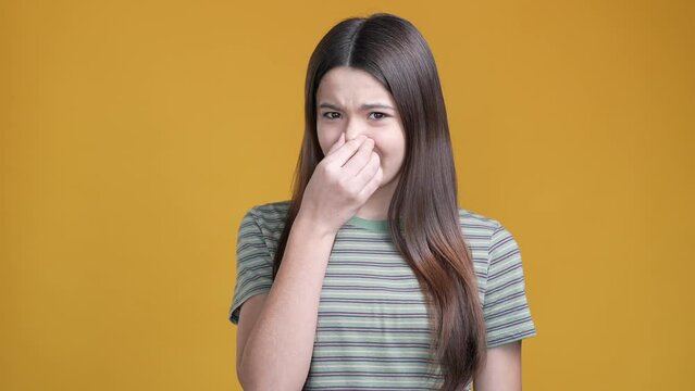 Schoolkid not like awful smell reject isolated shine color background