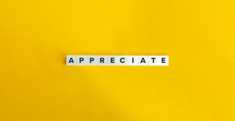 Appreciate Word on Letter Tiles on Yellow Background. Minimal Aesthetics.