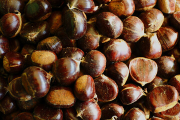 Lots of chesnuts are on grocery shelf.