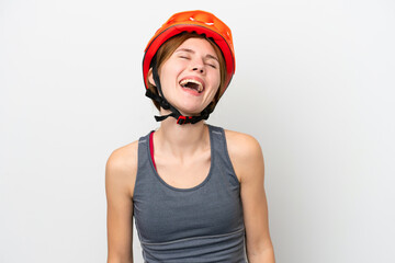 Young cyclist English woman isolated on white background laughing