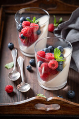 Homemade and tasty Panna Cotta made of gelatin and berries.