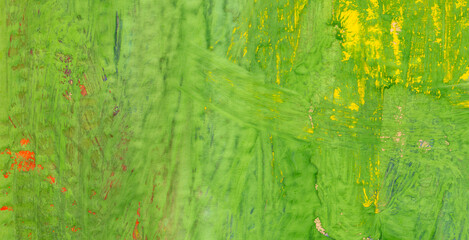 Fototapeta premium Green paint on paper as a background.