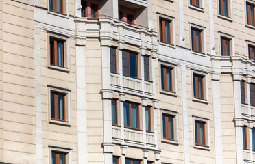 Windows in the walls of the building as a background.