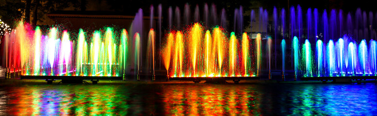 Multicolored fountain at night