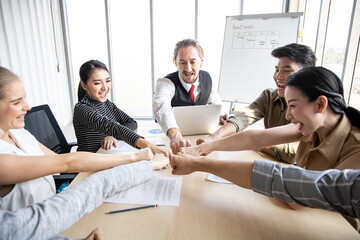 Group business people with join hands of teamwork.