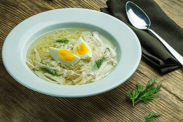 Chicken broth with Noodles on Served Table, Restaurant food