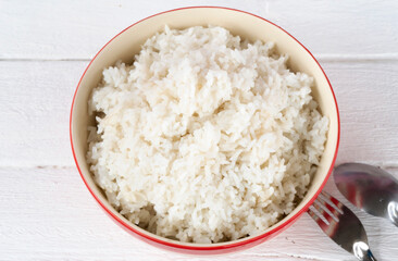 Cooked white rice in  ceramic bowl