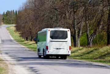 Fototapeta na wymiar public transport on the highway during a beautiful day in the spring
