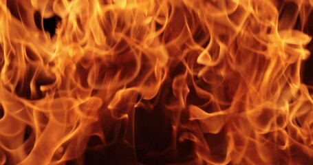 Flames of fire on black background in slow motion - Powered by Adobe
