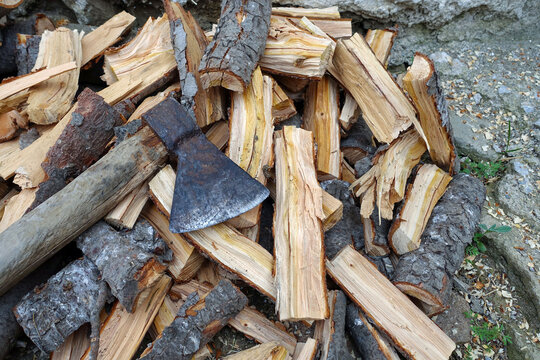 ax and chopped wood, chopping wood with an ax,