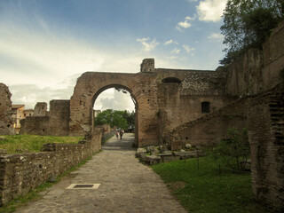 The ruins of the Roman forum (Gates of Rome) against blue sky on a sunny day in Rome, Italy