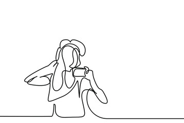 beautiful young woman taking photos laughing on vacation with phone and camera in hand