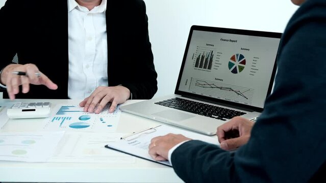 Business meeting, Brainstorming between financiers and accountants analyzing data to plan a company's tax breaks and cost savings, Business Strategy Modification, Working together.