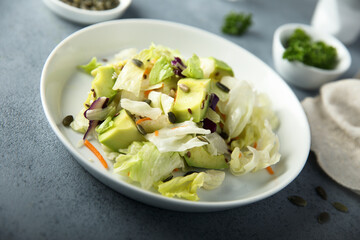 Leaf salad with avocado and seeds