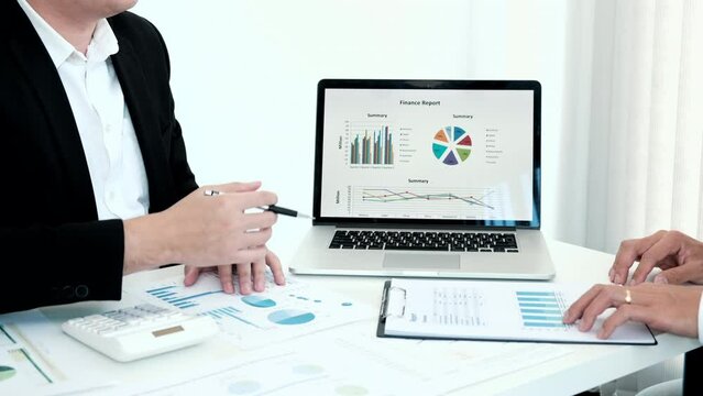Business meeting, Brainstorming between financiers and accountants analyzing data to plan a company's tax breaks and cost savings, Business Strategy Modification, Working together.
