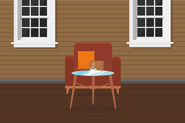 armchair chairs and a table with coffee on the veranda of the house with windows terrace cafe