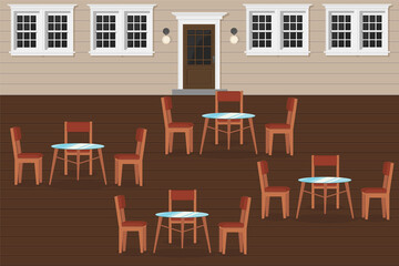restaurant terrace with wooden tables and chairs
