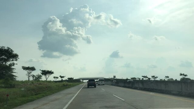 Point of view driving on toll road highways, East java, Indonesia