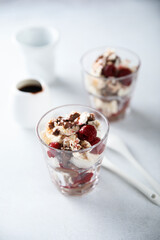 Homemade meringue dessert with raspberry and chocolate