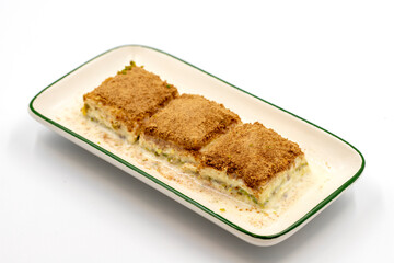 Cold baklava. Baklava with milk isolated on a white background. Mediterranean cuisine delicacies. Close-up. Local name soguk baklava