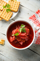 Traditional homemade beetroot soup with fresh parsley