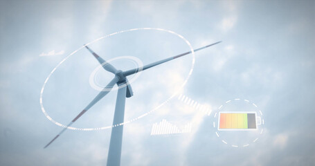 Low angle shot of a wind turbine with a battery symbol