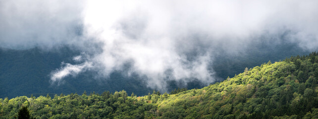 Sunlight Piercing the Clouds to Rest on the Slopes of the Appalachian Mountains Viewed Along the Blue Ridge Parkway