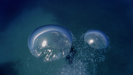 Artistic underwater photography of air bubbles going up to the surface