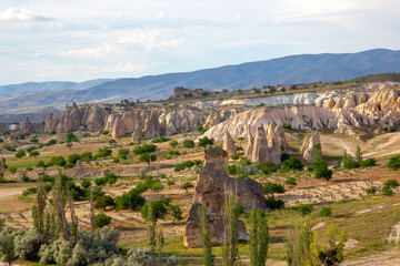 Volcanic rocks and limestone cliffs in Cappadocia valley. Turkey. Tourism and travel. geology and soil erosion