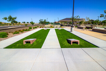 Two Corn Hole Courts With Artificial Grass In Public Park