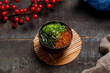 Trout Roe Chawanmushi in a bowl with chopsticks isolated on mat side view of taiwan food