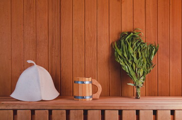 Bath accessories on the shelf. Eucalyptus Broom. Photo background